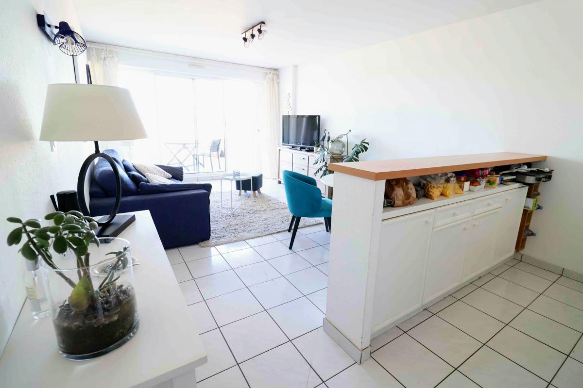 Appartement 1 ch terrasse jardinet cave garage 