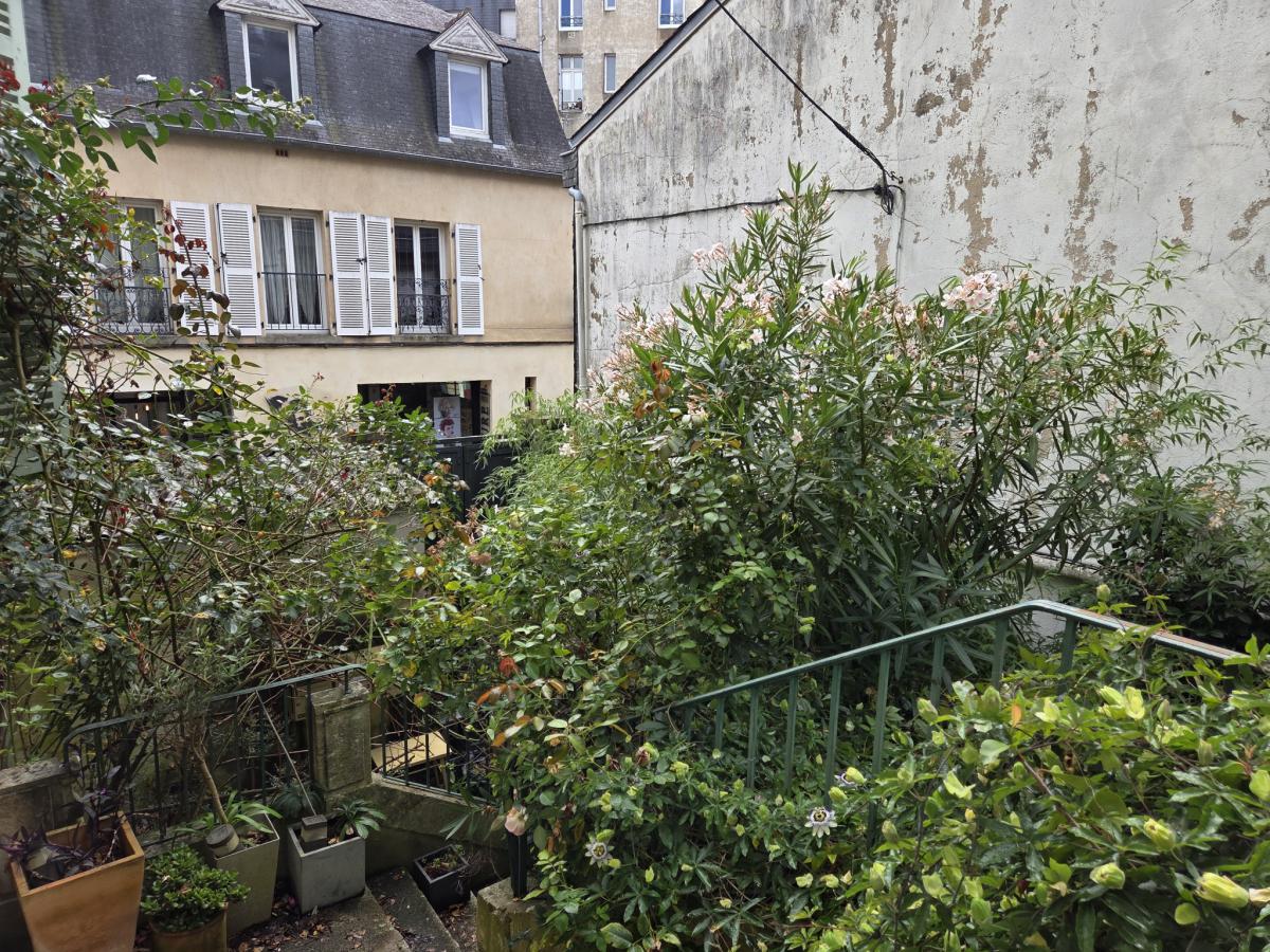 Centre-ville appartement ancien lumineux 2 ch cave