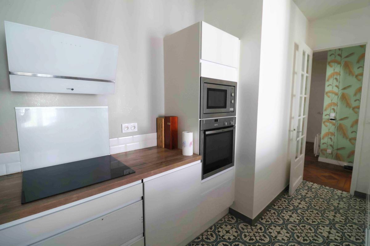 Vue dégagée appartement ancien rénové 3 ch
