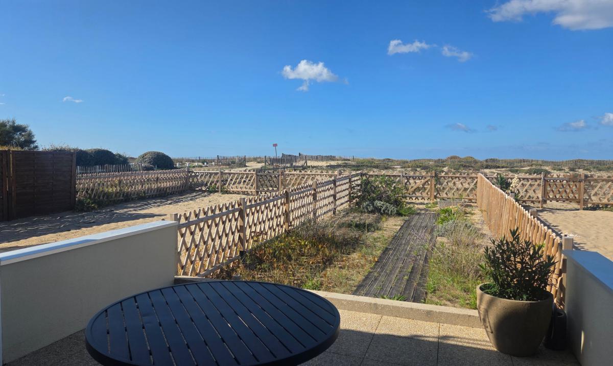 Appartement 1 ch terrasse jardinet cave garage 