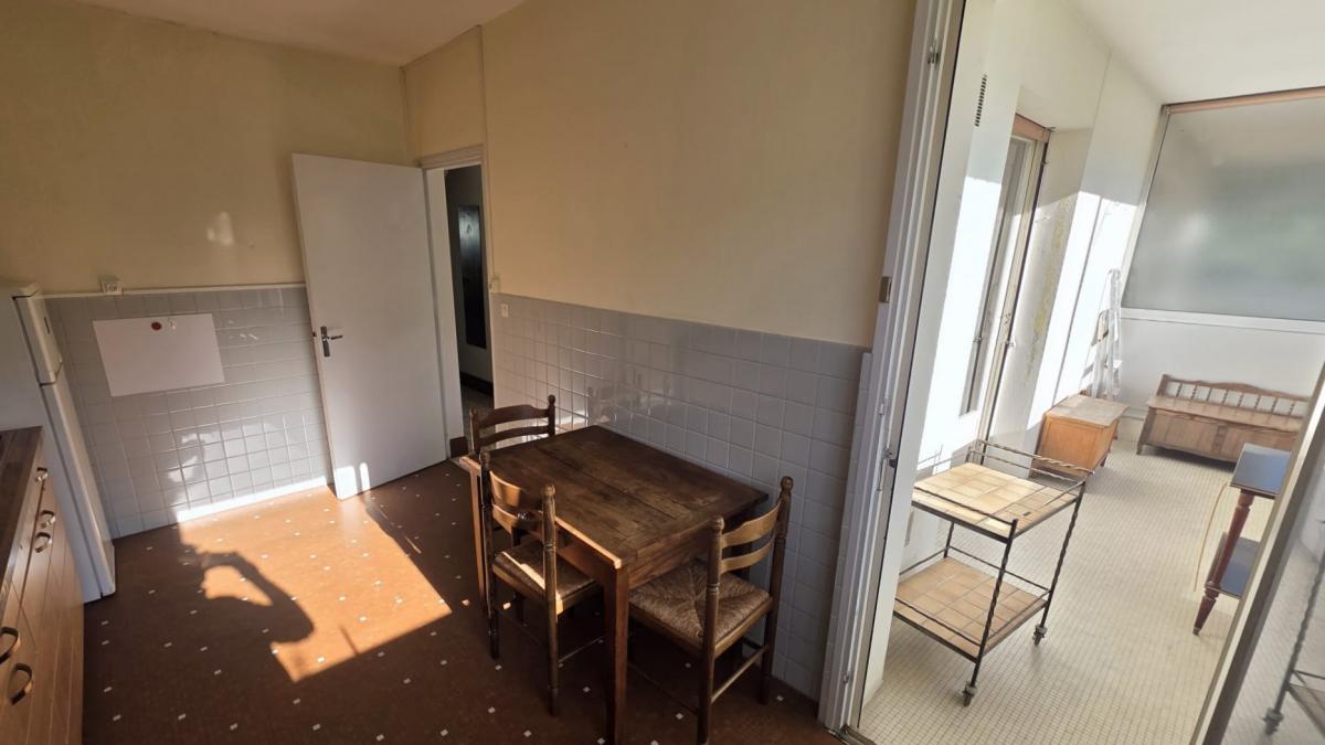 Appartement traversant balcon-terrasse loggia + cave